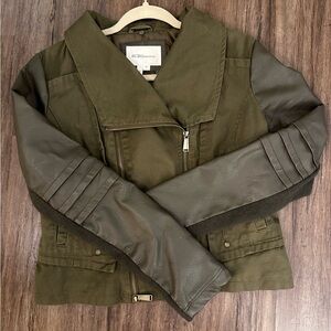 BCBGeneration zipper denim moto jacket with faux leather sleeves. Size M